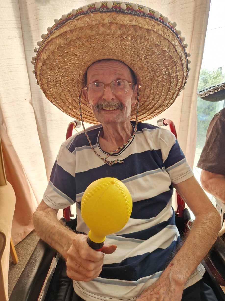 Fairways Nursing Home resident celebrating International Tea Day with festive, themed activities, promoting well-being and high quality of life